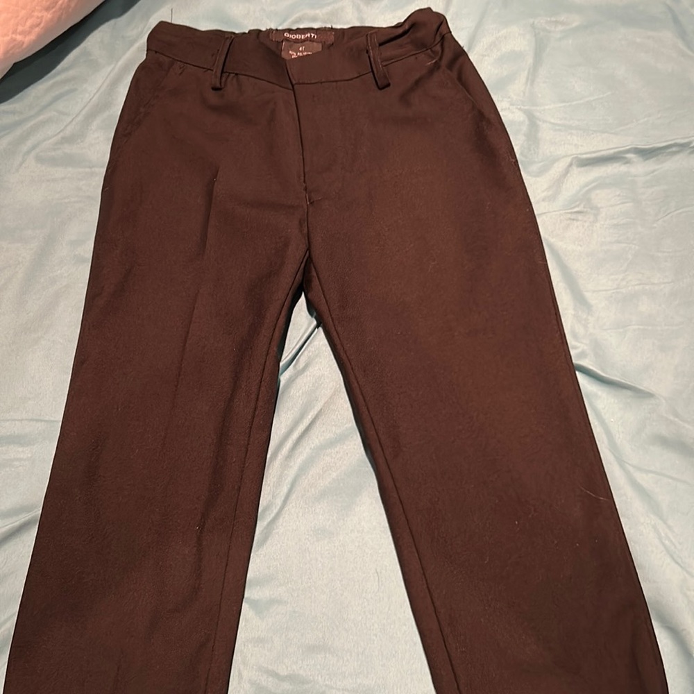 Boys 4T dress pants.  I have 2 pairs.  My twins wore them once to a wedding.